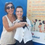 animal adotado em feira por família