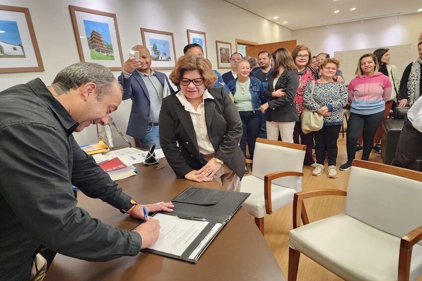 Guto Volpi e comerciantes