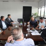 Carla Morando em reunião no Estado