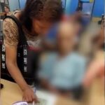 mulher com cadáver no banco