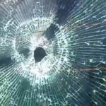 vidro atingido por disparo