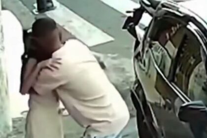 pai abraça filha que escapou por centímetros de atropelamento fatal em Diadema