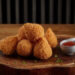 No Dia Nacional da Coxinha, salgado da Padaria Brasileira eleito o melhor do mundo ganha novos sabores